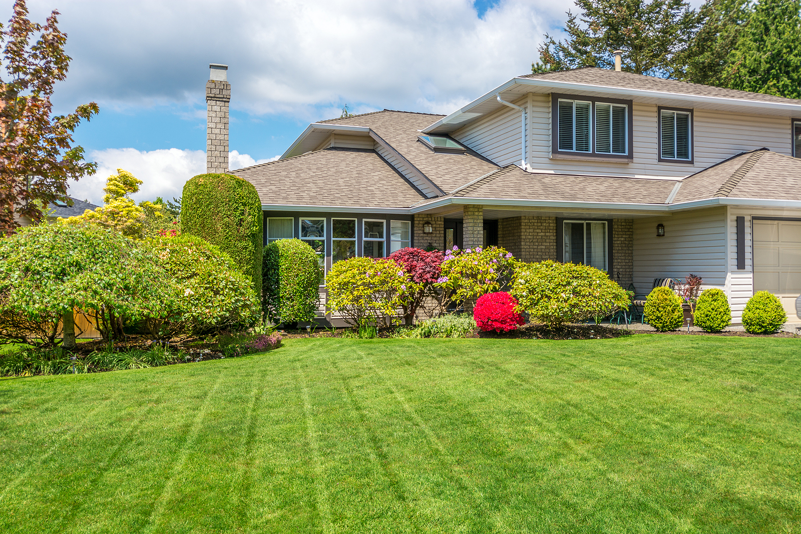 Home with Lawn Care by Thrive Lawn Care